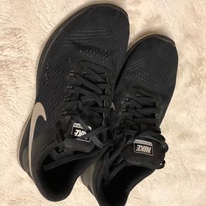 Nike black running shoes